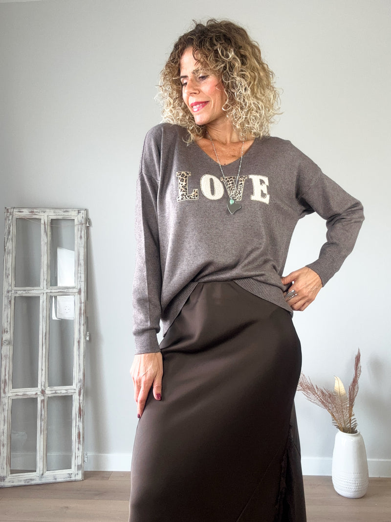 Falda satinada pico