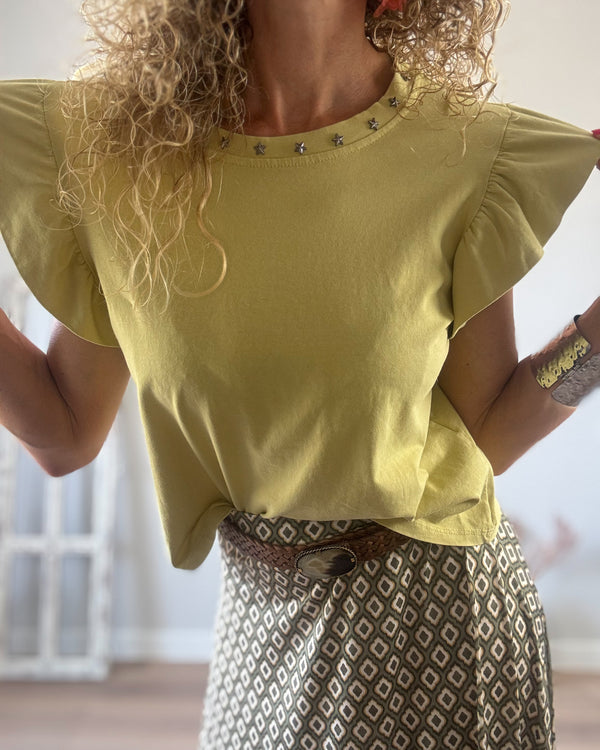 Camiseta amarilla tachas