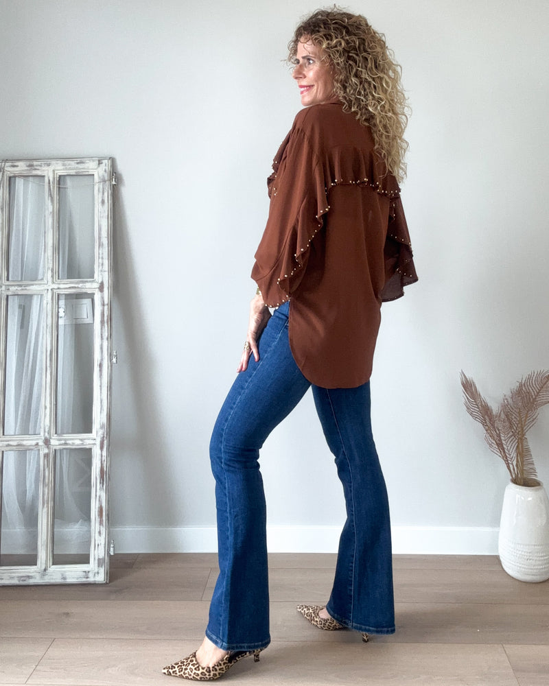 Blusa volantes tachas