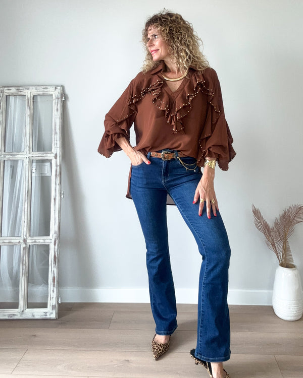 Blusa volantes tachas