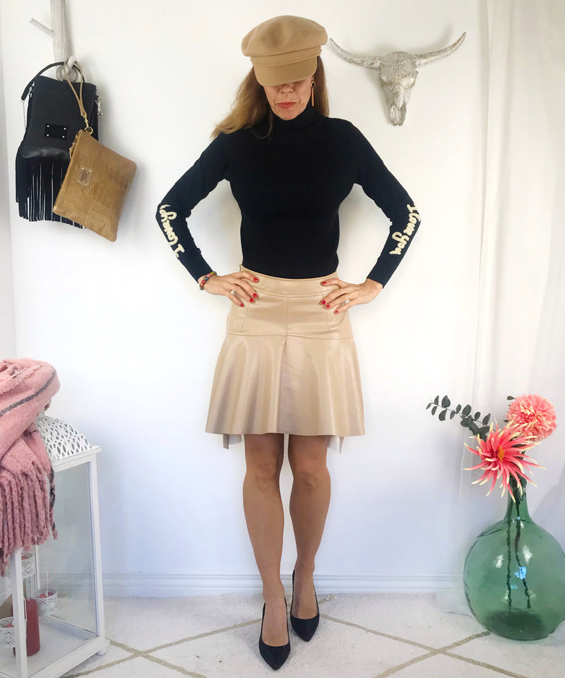 Falda mini beige